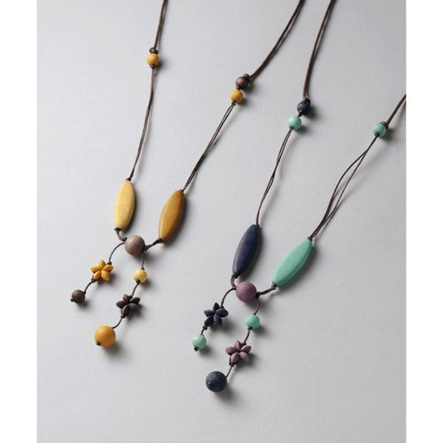 4582640640168







東京かんかん
ウッド枝垂れフラワーネックレス