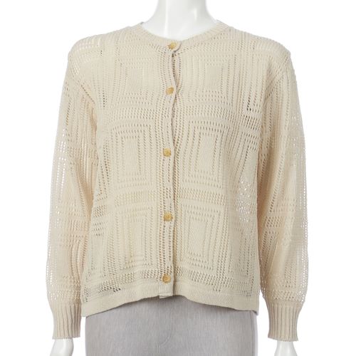 愛装
幾何学柄透かし編み丸首カーディガン